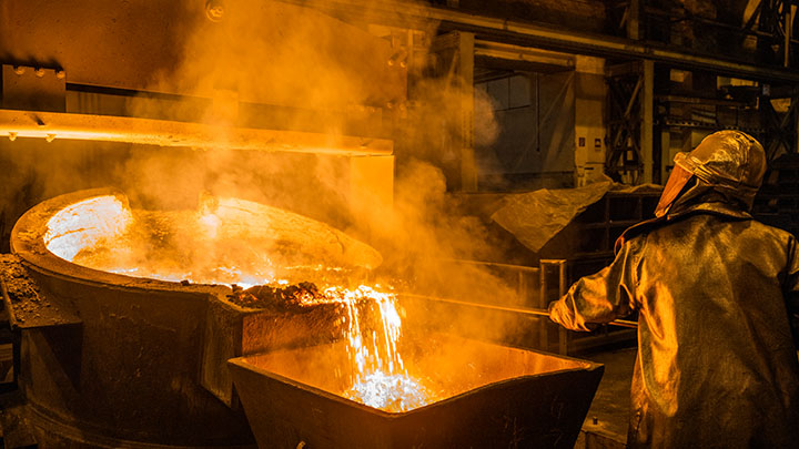 A foundryman preparing the cast iron