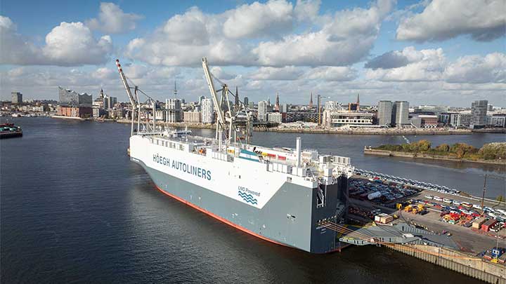 Hoegh Autoliners ferry in front of the Hamburg skyline