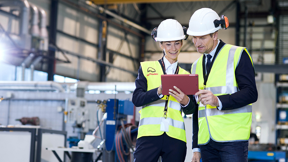 MAN with red helmet working on product